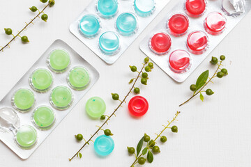cough sore throat pastille colorful extract  herbal with flower arrangement flat lay style on background white 