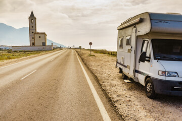 Caravan and church San Miguel, Cabo de Gata, Spain