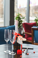 Romantic still life with bottle of champagne and two champagne glasses. Valentines day.