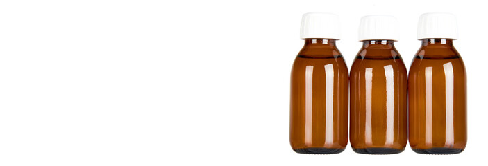 Medical glass bottle, syrup. Isolated on white background. Copy space template, banner.