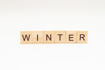 Winter words on wooden blocks. Concept Seasons of year