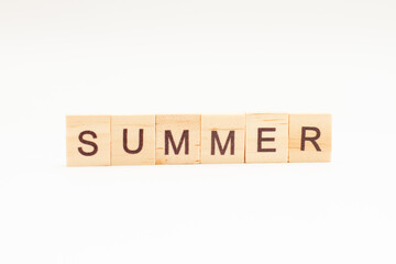 SUMMER words on wooden blocks. Concept Seasons of year