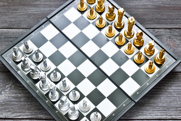 Golden and silver chess figures. Chess.Intellectual duel and tactical battle in business. Strategy...