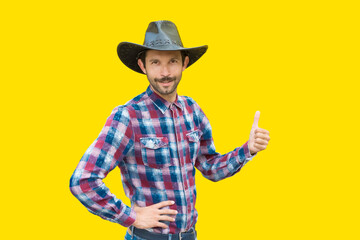 unshaven man smiling shows hand gesture everything is fine