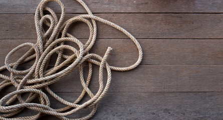 Obraz premium Close-up of rope and old woody for copy space.