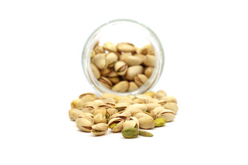 pistachio nuts in a glass bowl