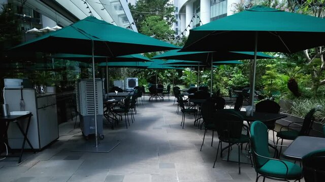 Close up shot of empty tables and chairs in the restaurant. Restaurants are closed due to covid-19 epidemic.