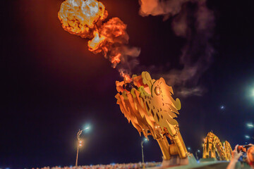 dragon making fire on the Dragon Bridge, a famous bridge in Da Nang. Da Nang City is Famous city for visiting in Vietnam