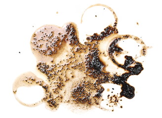 Wet coffee sediment, residue isolated on white background, top view