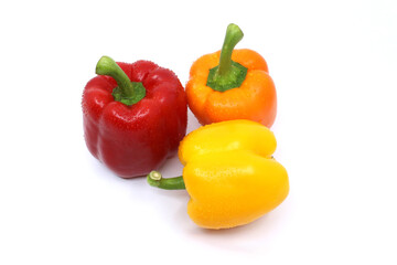 three peppers isolated on white