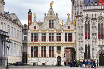 Fototapeta na wymiar Historic buildings of the Brugse Vrije with the old Civil Registrar building on the right on the Burg Square in the heart of the medieval city of Bruges, Belgium