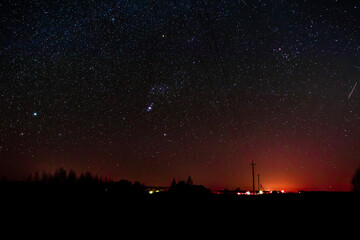 Fototapeta premium night country landscape. a sky full of stars