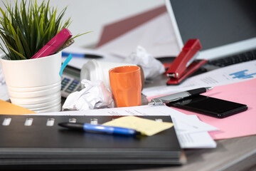 Messy and cluttered desk