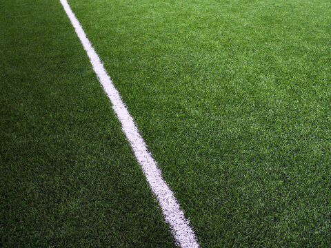 soccer field on green grass or  football field or futsal background