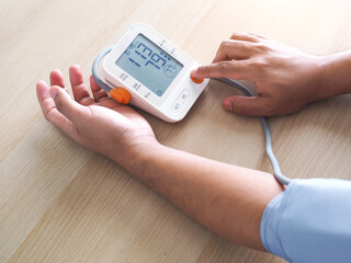 Checking blood pressure with measuring device digital blood pressure monitor