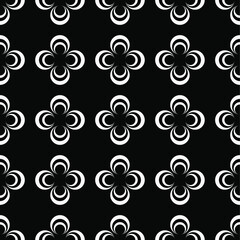 Fototapeta premium Seamless abstract pattern of circles on a black background.