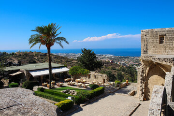 Top view of the Arches and the Bellapais Abbey territory, Kyrenia, the sea and the bright blue sky. White Abbey, the Abbey of the Beautiful world. Kyrenia. Cyprus.