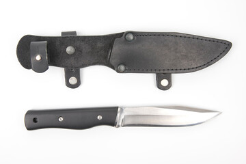 knife for camping and hunting in a leather case on a white background.  cutting tool. isolated object