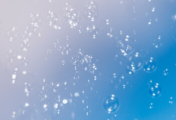 Beautiful blue gradient with soap bubbles float background.