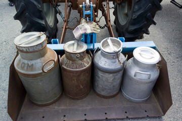 old farm milk containers, Finland