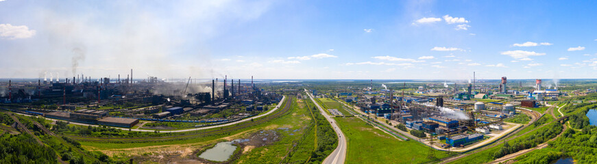 panorama of blast furnaces and other elements of the black metallurgical industries and the chemical industry in Cherepovets, a view of the structure from a height.