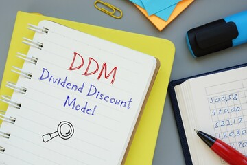 Dividend Discount Model DDM inscription on the piece of paper.