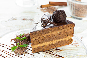 Piece of chocolate cake with glazed topping