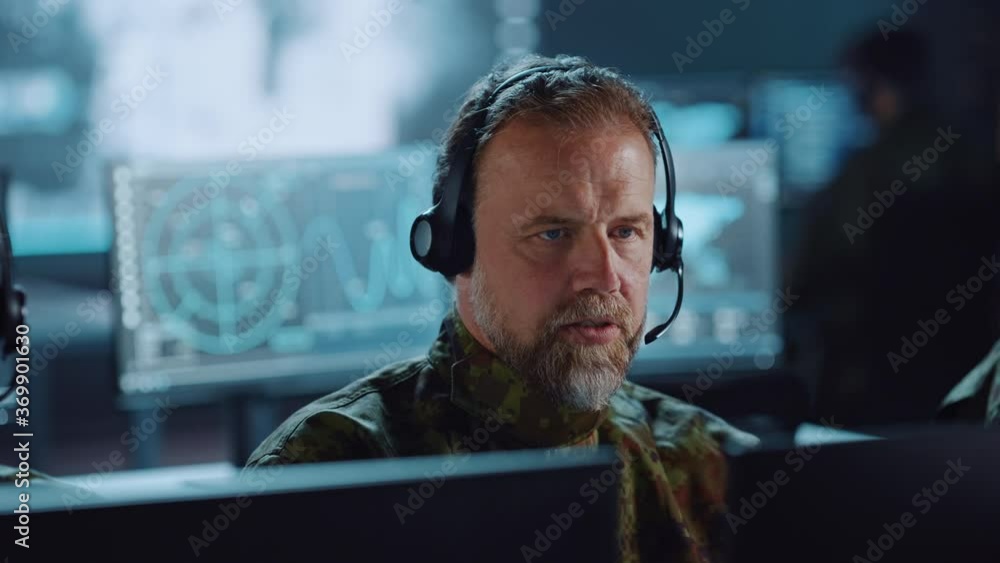 Aufkleber Military Surveillance Team of Officers in Headsets Working in a Central Office Hub for Cyber Operations, Control and Monitoring for Managing National Security, Technology and Army Communications.