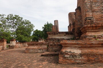 Fototapeta premium Red brick Structure of the temple , Wat ma hae yong, Ayutthaya , An Historic Temple 