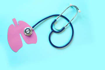 Lung health therapy medical concept . silhouette of the lungs and a stethoscope on a blue background. concept of respiratory disease, pneumonia, tuberculosis, bronchitis, asthma, lung abscess