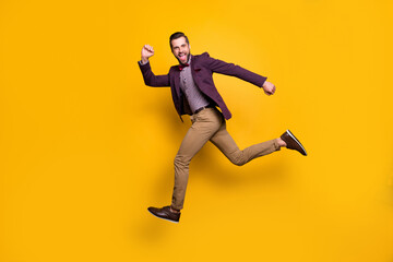Fototapeta na wymiar Full length profile photo of handsome rich clothes stylish guy well-dressed jumping high up rushing store mall sales wear plaid shirt blazer trousers shoes isolated yellow color background
