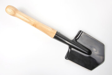 small shovel for tourism and earthworks on a white background