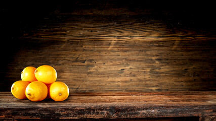 Fresh fruits and wooden desk 