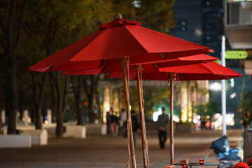 A night town street and red parasol