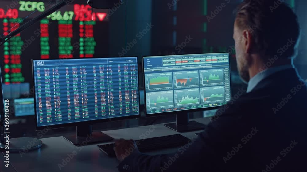 Poster Professional Financial Data Analysts Working in a Modern Monitoring Office with Live Analytics Feed on a Big Digital Screen. Monitoring Room with Finance Specialists Sit in Front of Computers. 