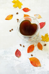 Autumnal concept with mup of Cup of hot coffee. Free space for your text.