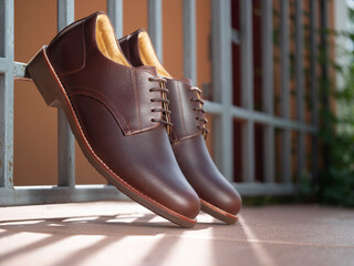 Men fashion brown shoes leather on the floor.