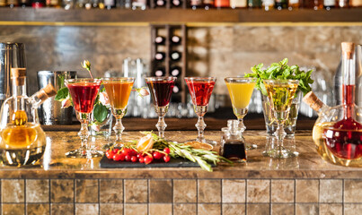 berries and herbal shots in the bar