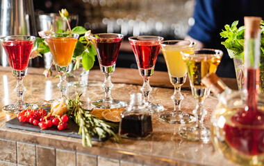 berries and herbal shots in the bar