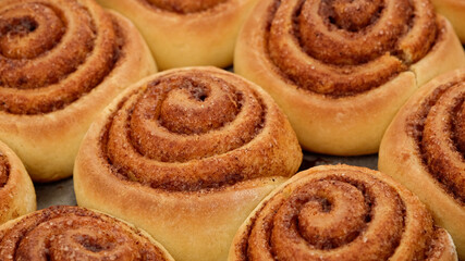 Freshly baked cinnamon rolls or Cinnabon close up