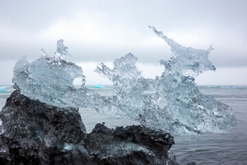 blue Ice on the shore of the ice lagoon in Iceland