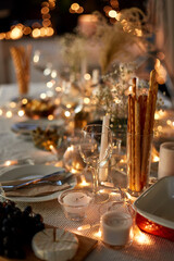 eating, holiday and celebration concept - dinner party table serving at home
