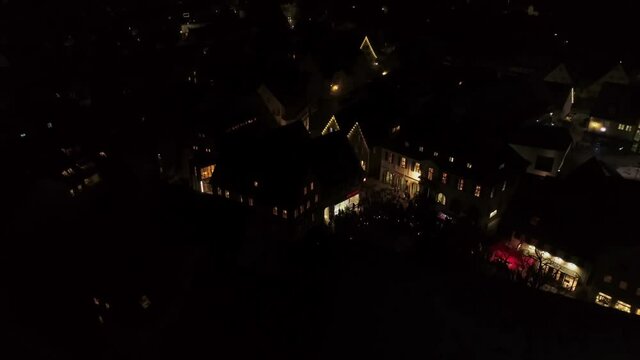 Drone flight night Germany in city Weilheim an der Teck - Townhall and church