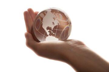 Small globe held by a person