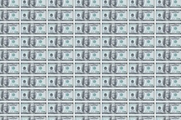 100 US dollars bills printed in money production conveyor. Collage of many bills. Concept of currency devaluation