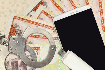 100 Dominican peso bills and smartphone with police handcuffs. Concept of hackers phishing attacks,...