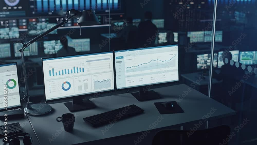 Aufkleber Two Digital Computer Screens with Financial Analytical Data in Modern Monitoring Office. Control Room with Finance Specialists Sit in Front of Computers. 