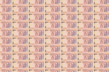 10 Indian rupees bills printed in money production conveyor. Collage of many bills. Concept of...