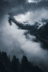 moody and dark  scenery on Aletsch Glacier an a cloudy and rainy day