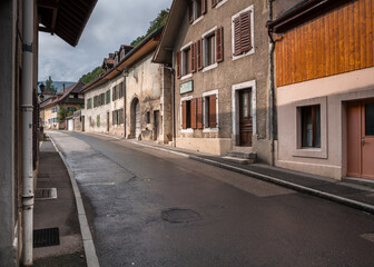 Fototapeta na wymiar Street view in tiny and historic Romanmotier-Envy village, located in Canton Vaud, Switzerland.